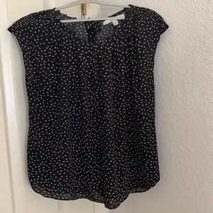 Black and white cap sleeve blouse. Size XL.